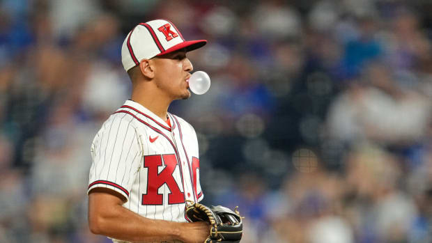 Aug 13, 2022; Kansas City, Missouri, USA; Kansas City Royals second baseman Nicky Lopez (8) gets ready to pitch against the Los Angeles Dodgers during the ninth inning at Kauffman Stadium. Mandatory Credit: Jay Biggerstaff-USA TODAY Sports